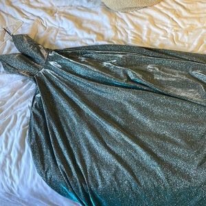 Blue sparkly dress with two side pockets and has only been worn once. New cond.